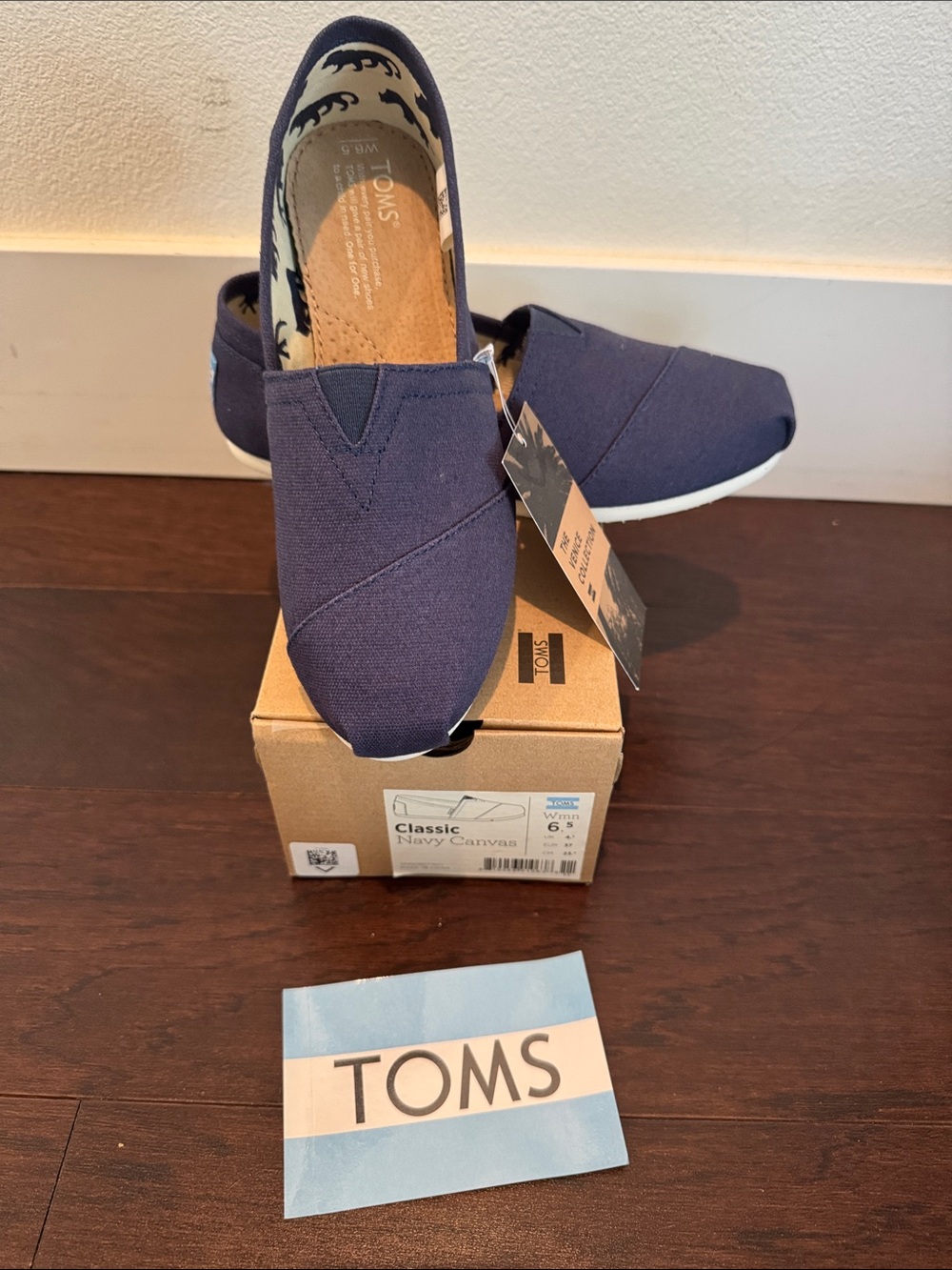 Toms Classic Canvas Slip-Ons in Navy Blue
